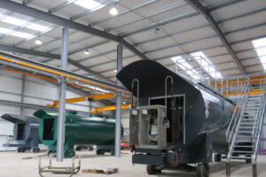 Three huge Bulk Horizontal Diesel Tanks by Fuel Proof sit mid-assembly in their British factory